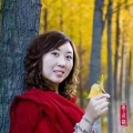 屈春英（妩媚的风儿）